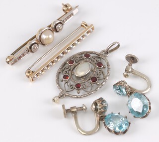A 14ct gold bar brooch set demi-pearls marked Shreve & Co., a gilt metal bar brooch set pearl and white stones, a pair of gold marked 9ct earrings and a pendant marked 930 