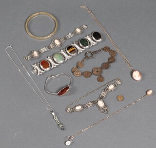 A cameo portrait pendant in a gold marked 9ct mount hung on a gold marked 9ct chain 2.4g, a Mexican silver and hardstone bracelet, a rolled gold bangle, a coin bracelet and other items of costume jewellery 