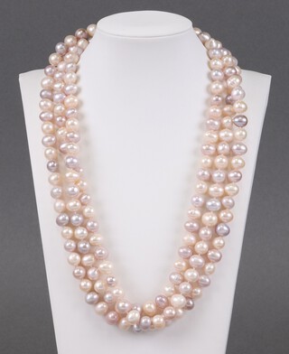 A string of pink and white cultured pearls, approx. 163cm