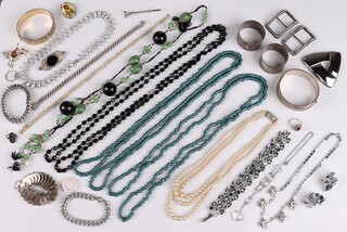 An engraved hollow silver bangle 25g, a pair of shoe buckles, a triple row of simulated pearls and a quantity of costume jewellery 