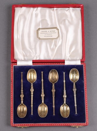 A cased set of 6 silver gilt Coronation anointing teaspoons, Birmingham 1952, with Coronation mark by William Suckling Ltd., 54g