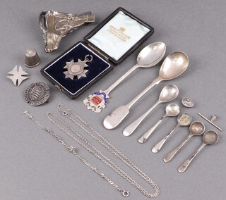 A Victorian silver fiddle pattern jam spoon Exeter 1845, silver souvenir spoon, 5 silver salt spoons, silver thimble) and 2 silver badges 66g 