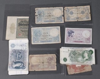 Three blue five pound notes, nineteen green one pound notes and other bank notes 