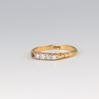 A gold ring set 4 (ex 5) diamonds, size O 1/2, 2.4g 