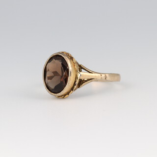 A gold testing as 9ct smoky quartz ring, size P 1/2, 2.3g 
