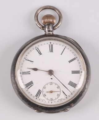 A lady's Omega open face fob watch with enamelled dial, Roman numerals and subsidiary second hand, contained in a 935 case, the inside of the back cover marked Omega Z 3121835
