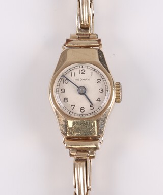 A lady's Swiss wristwatch marked Yeoman with silvered dial, Arabic numerals, movement marked 15 jewels Swiss Made, contained in a 9ct gold case with integral bracelet 8.2g excluding glass and movement 