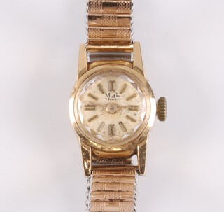 A lady's MuDu wristwatch the dial with batons, movement marked 17 jewels, contained in an 18ct gold case with gilt bracelet 