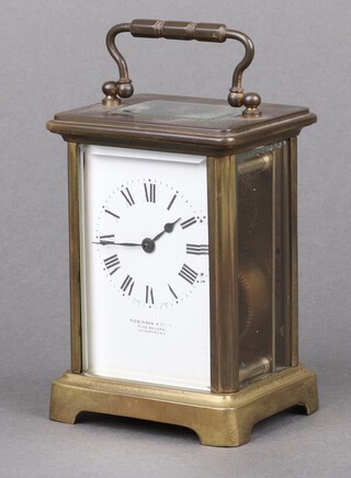 A French 8 day carriage timepiece, the 6cm enamelled dial marked Robinson & Co, The Square Shrewsbury and with Roman numerals, contained in a gilt metal and glass case, complete with key 11cm h x 7.5cm w x 6cm d  