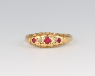 A gold marked 18ct ruby and diamond set ring, size L, 2.3g 