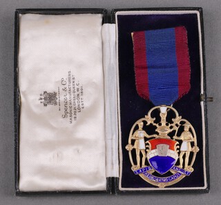 A Masonic silver gilt and enamel key stone charity jewel, Birmingham 1935 by Spencers, reverse no.2921,  29g gross 
