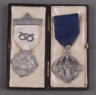 A Masonic silver hallstone jewel Birmingham 1928 together with a silver Royal Masonic Institute for Girls charity jewel, 55g gross 