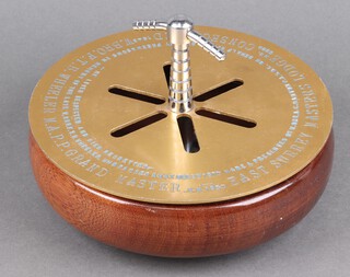 A Masonic turned mahogany and metal alms dish, the lid stamped East Surrey Masters Lodge no.5888, consecrated 1943 W Bro FTB Wheeler MA PP Grand Master w.m. 1950 22cm 