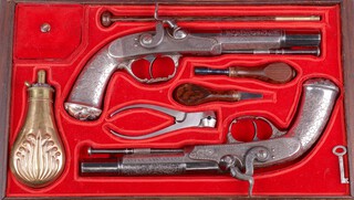 Jamieson Aberdeen, a pair of mid 19th Century 42 bore, Scottish all metal percussion belt pistols by Jamieson Aberdeen, with 16cm mirror blued barrels, the octagonal breeches and muzzles with silver inlaid scrolls, the round centre sections with fine scroll engraving, the signed locks and hammers engraved with scrolls and borders, the silver plated stocks engraved overall with scrolls and borders, the escutcheon with crest, motto and initials J.F.L, with grotesque mask butt caps and foliate embossed trigger guards.  Having plain blued steel belt hooks and ram rods.  Contained in a later rosewood and metal mounted case, containing steel pincer mould, nipple key, turn-screw, embossed copper powder flask, and key to the case  