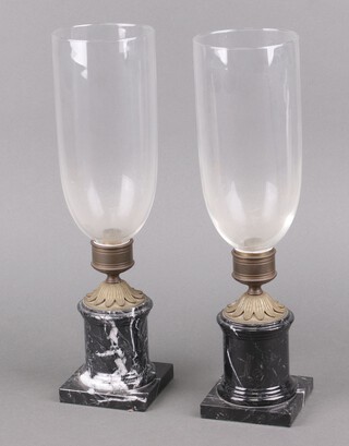 A pair of Regency style glass storm lanterns on gilt metal and marble bases 44cm h 