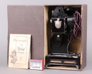 A Pathe "The Baby Projector", marked BB-Ex projector complete with instructions, boxed 