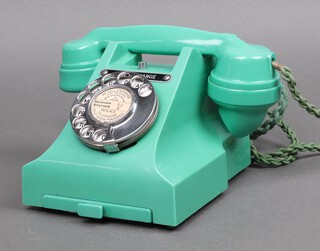 A GPO 300 series green Bakelite dial telephone with drawer to base and chrome dial, marked R13L S53/3A, converted for modern use  