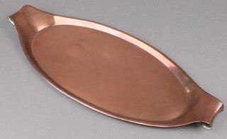 An Art Nouveau copper boat shaped oval twin handled tray, 54cm 