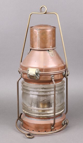 A copper and brass masthead lantern marked A2107 49cm 
