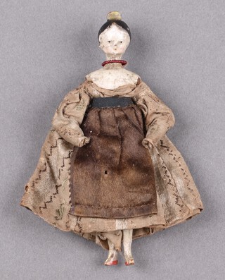 A Victorian Grodnertal type jointed peg doll in original costume and necklace 11.5cm  