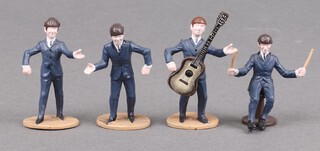 The Beatles, a collection of 4 plastic figures (likely by NEMS) of each of the Beatles members (Ringo missing drums, Paul and George missing guitars) 5cm h
