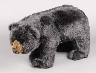 An American Ditz Designs plush footstool in the form of a black bear 45cm h x 75cm w  