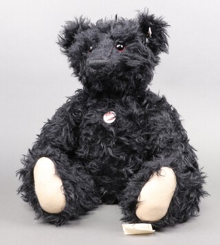 Steiff, a 2007 "Leo The 1912 Titanic Mourning Bear" in black mohair  (with growl box) 60cm h, limited edition 249/1000, unboxed but with certificate 
