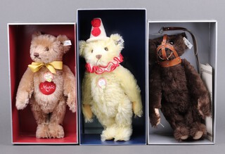 Steiff, 3 replica teddy bears to include "Teddy Clown 1926" in yellow mohair 35cm h, limited edition 7837/10,000 boxed and with certificate, a 1993 "Musical Teddy 1951" in caramel mohair 35cm, limited edition 3665/7000, boxed and with certificate and a 1991 "Muzzle Bear 1908" in dark brown mohair, limited edition 1307/5000, boxed and with certificate  