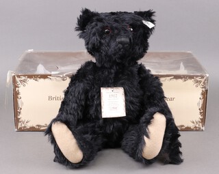 Steiff, a 1912 replica teddy bear in black mohair 48cm, limited edition 1121/3000 boxed and with certificate 