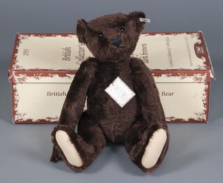 Steiff, a replica 1907 teddy bear in dark mohair 27cm h, limited edition 1455/3000, boxed and with certificate 
