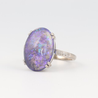 An 18ct white gold diamond and opal set ring, size J, 4.8g 