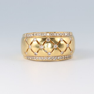 An 18ct gold wedding band set diamonds, size M, 7.7g 