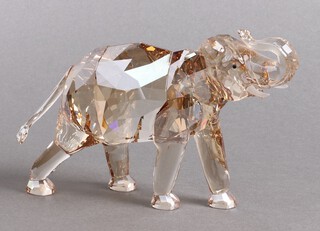 A Swarovski Crystal 2013 figure - Cinta Elephant, walking 11cm, boxed and with certificate 