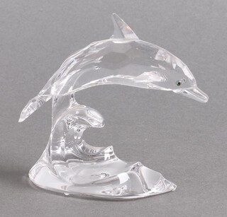 A Swarovski Crystal  figure - Dolphin on a Wave 10cm, boxed 