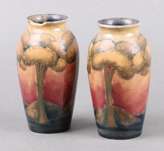 A pair of Moorcroft flambe glazed earthenware Eventide/Moonlight vases 12cm h, bases with signature marks and impressed Moorcroft Made in England 