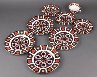Two Royal Crown Derby Imari pattern plates 1128 XLIX 22cm, 2 Royal Crown Derby Imari pattern plates 1128 LVI, 2 others (seconds), 3 ditto tea plates 1128 LXVII 16cm (1 a second) and a tea cup 1128 L