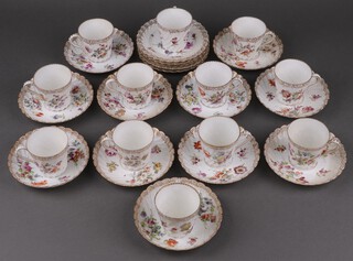 A 28 piece Dresden coffee service with floral decoration comprising 5 plates, 12 cups (2 ring flat) and 11 saucers (1 rings flat)
