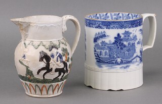 A 19th Century Staffordshire Prattware pottery jug with sparrow beak, decorated the Duke of Cumberland 15cm (old repair to the spout), together with 19th Century blue and white Willow pattern transfer decorated tankard 5cm (chips to base)  