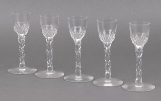 Five 19th Century liqueur glasses with faceted glass stems 