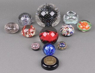 A large Whitefriars bubble glass paperweight 10cm, a Whitefriars swirled glass paperweight 4cm, a faceted Whitefriars paperweight 4cm and 9 other paperweights 