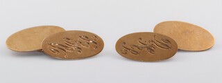 A pair of oval 9ct gold cufflinks, monogrammed, 3.4g