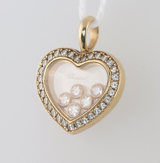 Chopard, an 18ct gold heart shaped pendant set diamonds (from the Happy Diamond Collection), gross weight 5.4g 