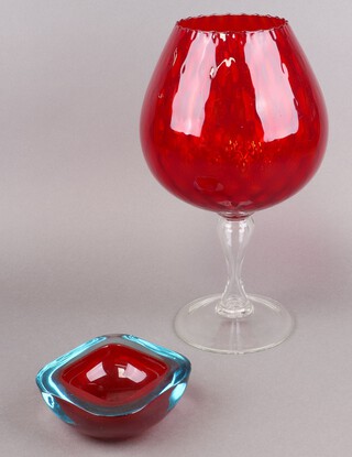 A Murano red and blue glass bowl 13cm together with an Empoli red glass balloon shaped vase with clear glass stem 37cm,