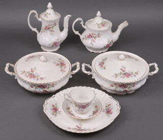 A 58 piece Royal Albert Rose Moss pattern dinner, tea and coffee comprising 2 twin handled tureens and covers, oval meat plate, sauce boat and stand, 6 dinner plates, 6 side plates, twin handled bread plate, 6 tea plates, 6 pudding bowls, teapot, sugar bowl and milk jug, 5 cups, 5 saucers, coffee pot, cream jug and sugar bowl, 6 coffee cups, 6 saucers 