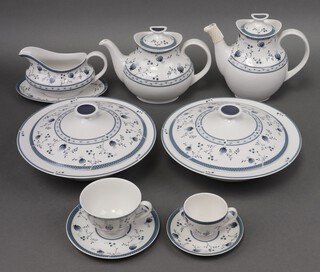 A Royal Doulton 60 piece Cambridge pattern dinner /coffee service comprising pair of tureens and covers, oval meat plate, sauce boat and stand, 7 dinner plates, 6 side plates, 6 tea plates, 6 pudding bowls, teapot, sugar bowl and milk jug, coffee pot, cream jug, sugar bowl, 6 coffee cups, 6 saucers 