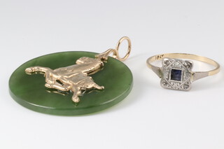 A gold marked 18ct ring, size O together with a polished green hardstone and gilt mounted pendant 