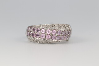 A 9ct white gold dress ring set diamonds and pink stones, size Q 1/2, 3.6g and 1 other set blue and white stones size K  
