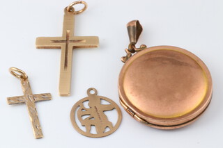 Two 9ct gold crosses, a Sagittarius charm 3g and a gold plated locket