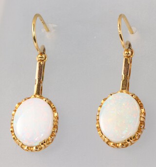 A pair of gold and opal drop earrings, 2.4g 