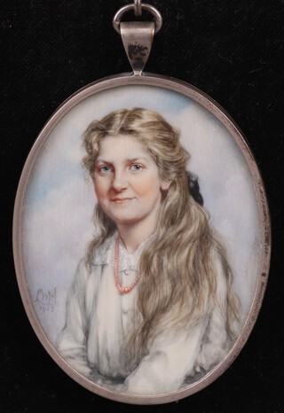 L.W.M., British School, Oval Miniature Portrait of a Lady wearing a White Shirt and Coral Necklace, watercolour on ivory, signed with initials "L.W.M." and dated 1915, within a sterling silver frame. Ivory Exemption Certificate VX2B9LMM